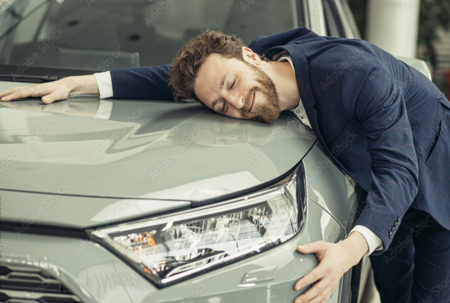 Man Hugging Car